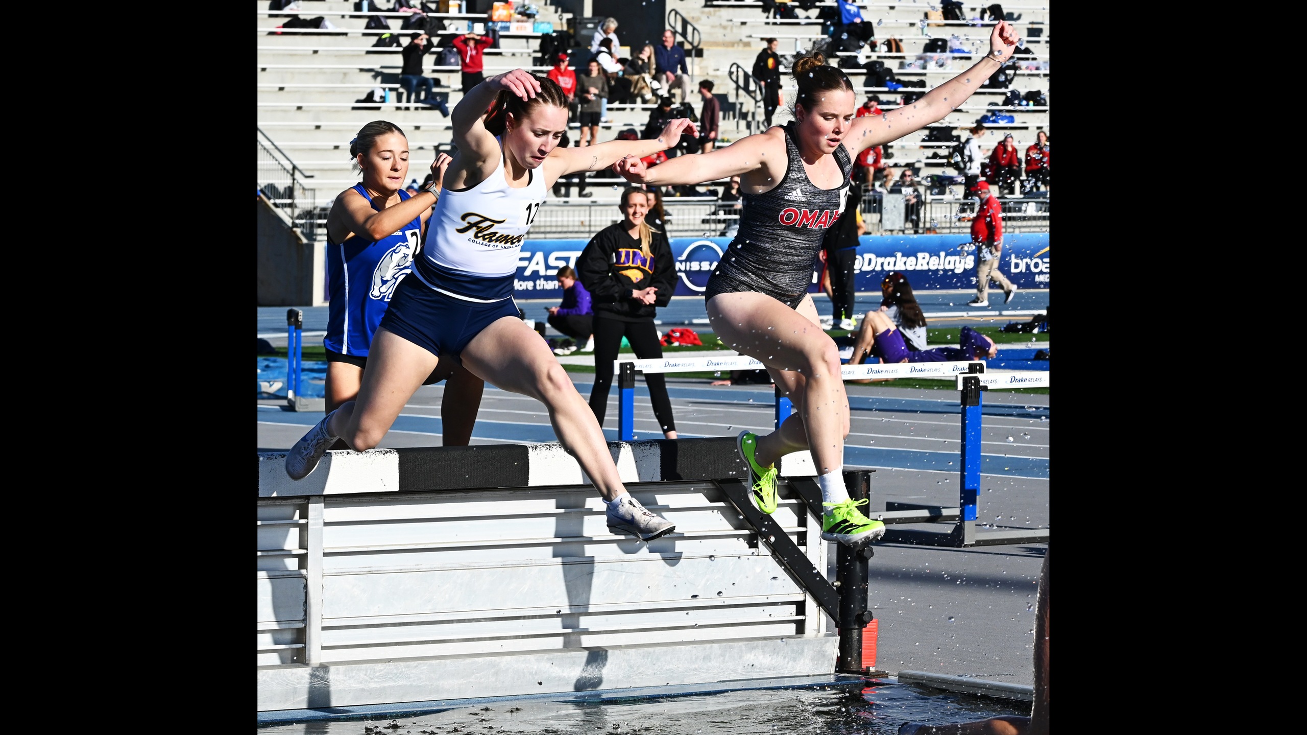 Elbert, Henderson win; four more program records fall